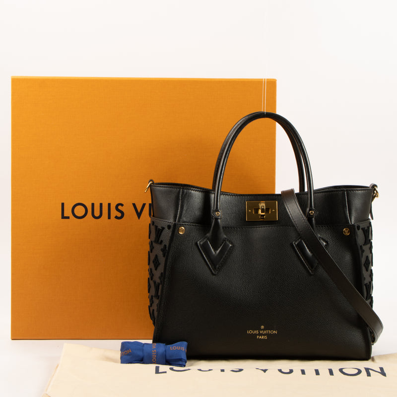Shop this authentic Louis Vuitton Black On My Side MM Bag pre-loved on Labellov.com