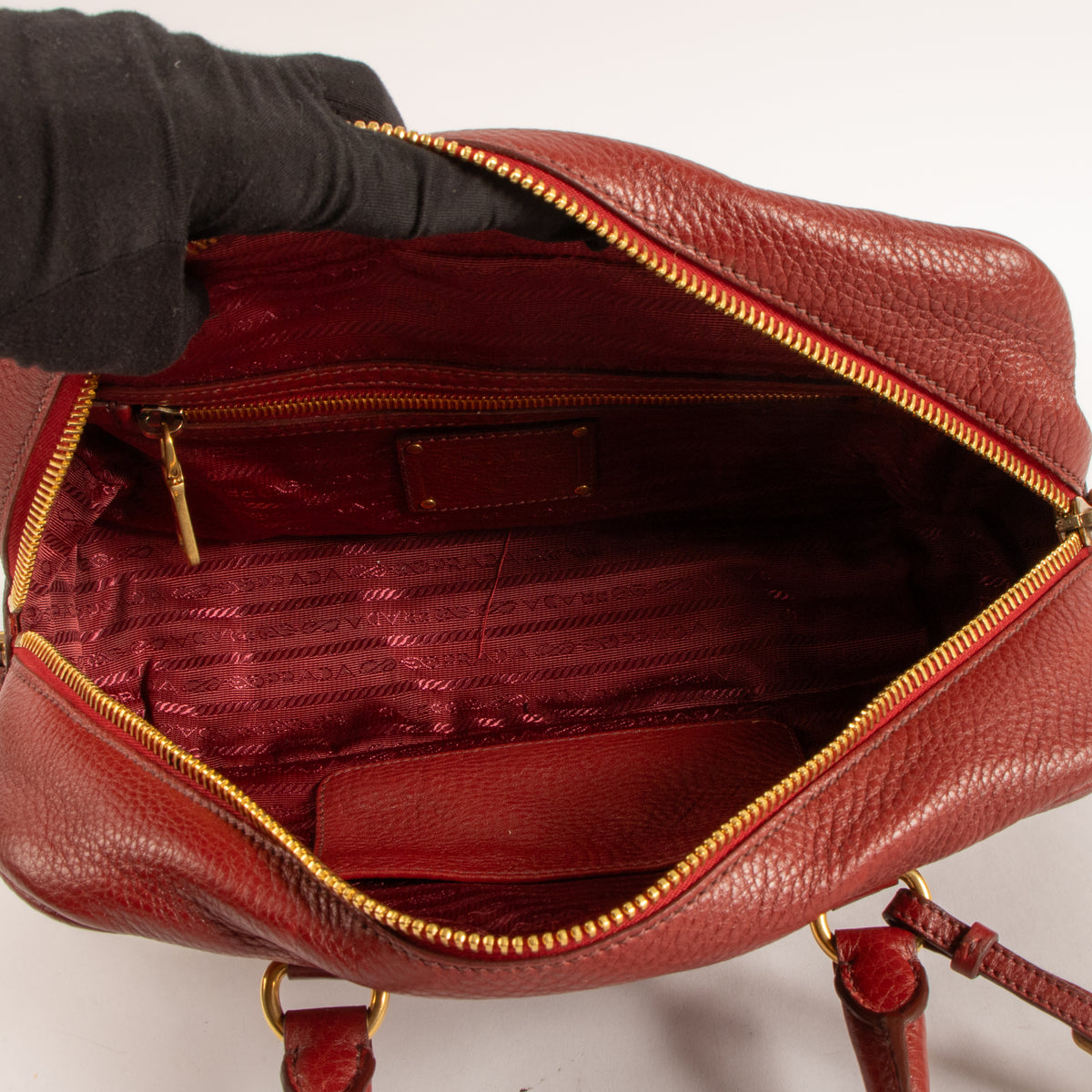 Shop this authenticPrada Red Vitello Daino Bowling Bag Pre-Loved on Labellov.com