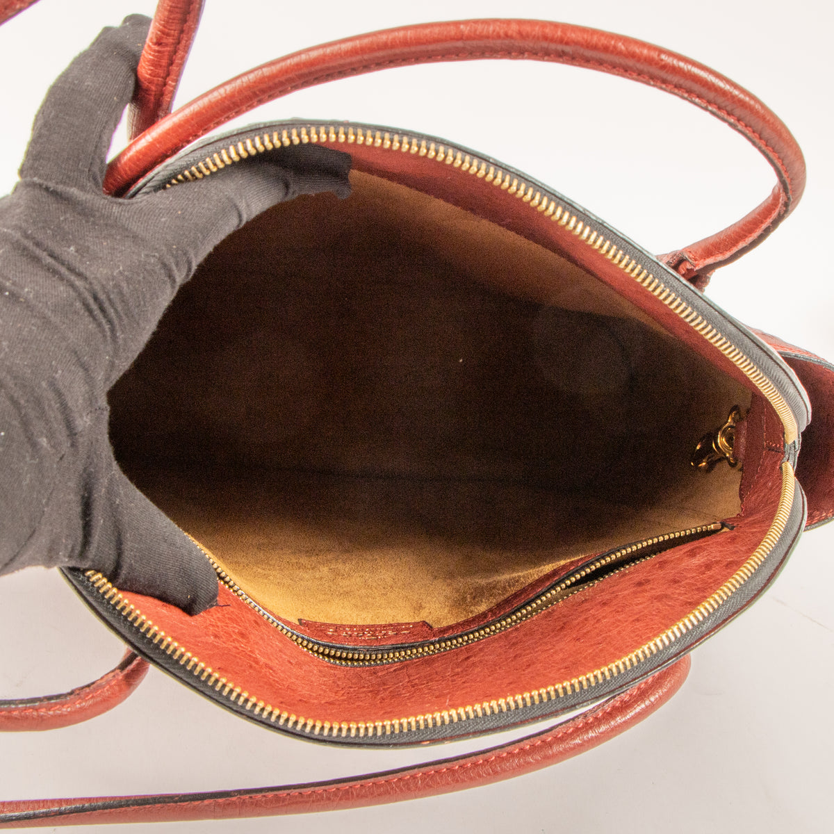 Shop the authentic Delvaux Rosso Ostrich Mousson Bag on Labellov.com.