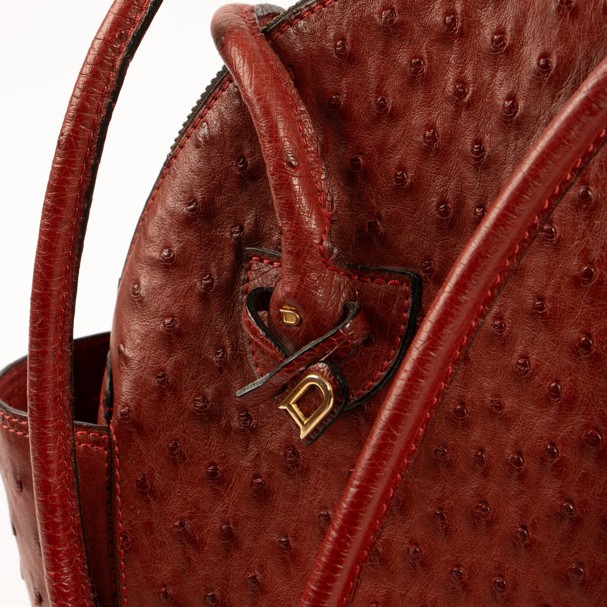 Shop the authentic Delvaux Rosso Ostrich Mousson Bag on Labellov.com.