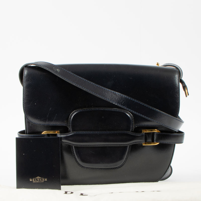 Shop this authentic Delvaux Vintage Blue Box Calf Flap Bag pre-loved on Labellov.com