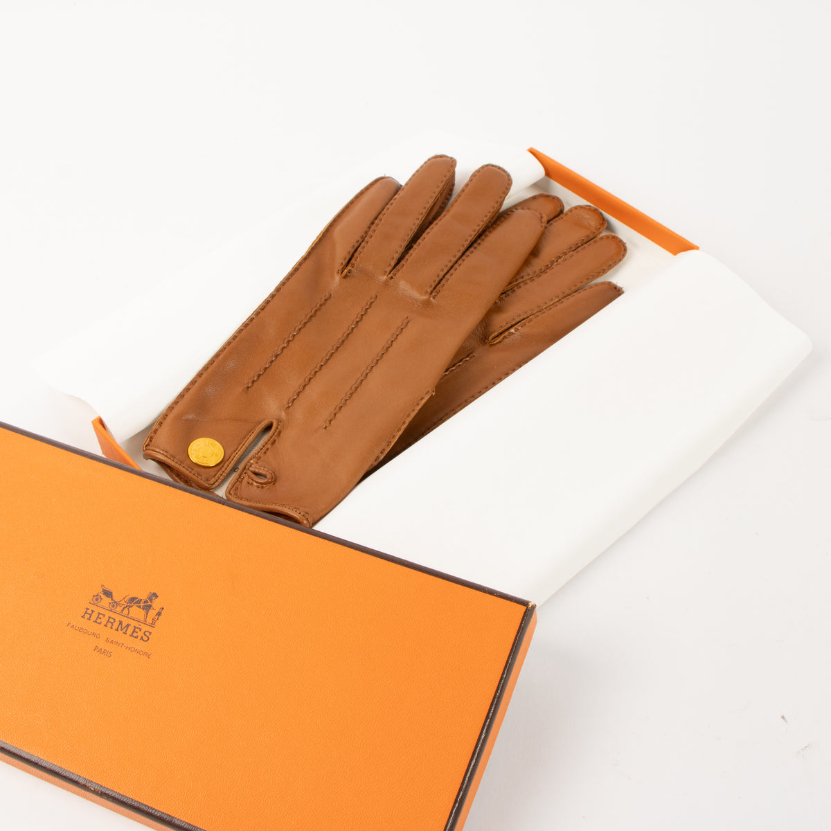 Shop the authentic Hermès Camel Lambskin Gloves - Size 7 on Labellov.com.