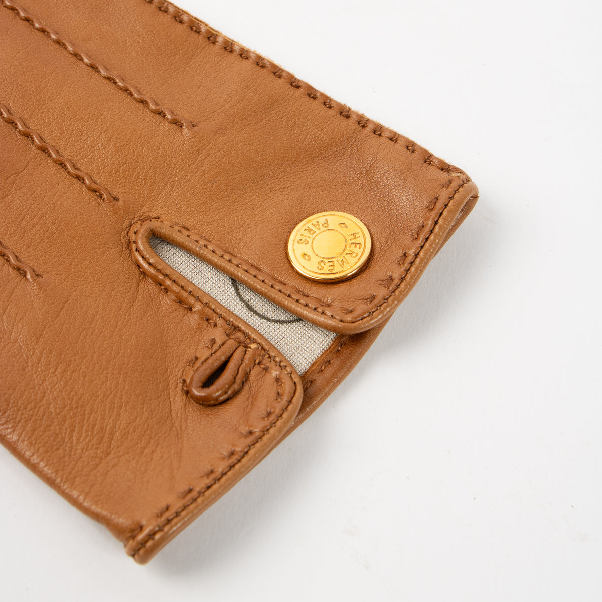 Shop the authentic Hermès Camel Lambskin Gloves - Size 7 on Labellov.com.