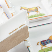 Shop the authentic Hermes Porcelain Chevaux Set of 4 Mini Ashtrays on Labellov.com.