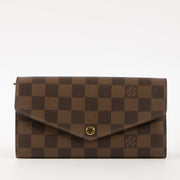 Shop this authentic Louis Vuitton Damier Ebene Sarah Wallet Pre-Loved on Labellov.com