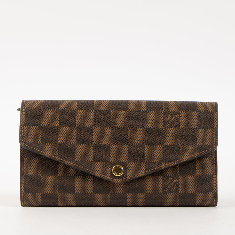 Shop this authentic Louis Vuitton Damier Ebene Sarah Wallet Pre-Loved on Labellov.com