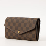 Shop this authentic Louis Vuitton Damier Ebene Sarah Wallet Pre-Loved on Labellov.com