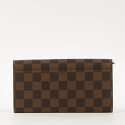 Shop this authentic Louis Vuitton Damier Ebene Sarah Wallet Pre-Loved on Labellov.com
