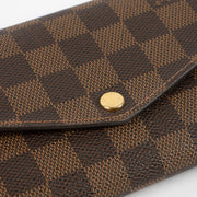 Shop this authentic Louis Vuitton Damier Ebene Sarah Wallet Pre-Loved on Labellov.com