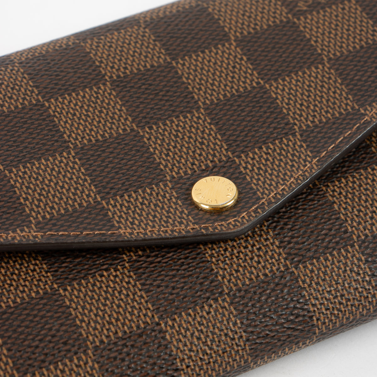 Shop this authentic Louis Vuitton Damier Ebene Sarah Wallet Pre-Loved on Labellov.com