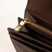 Shop this authentic Louis Vuitton Damier Ebene Sarah Wallet Pre-Loved on Labellov.com