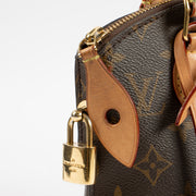 Shop this authentic Louis Vuitton Monogram Lockit BB Bag pre-loved on Labellov.com