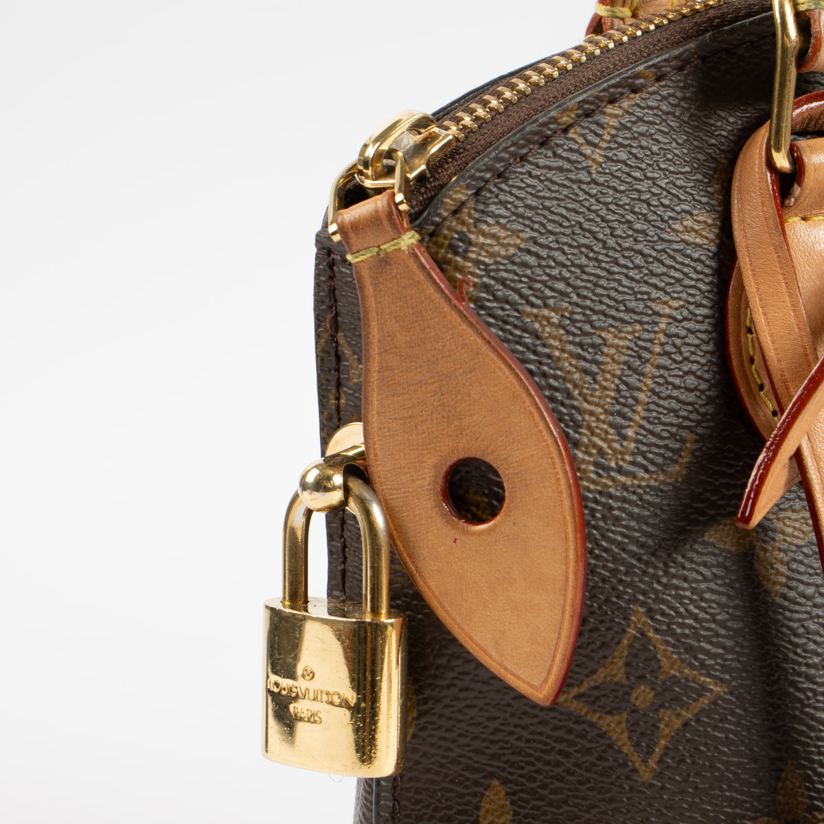 Shop this authentic Louis Vuitton Monogram Lockit BB Bag pre-loved on Labellov.com