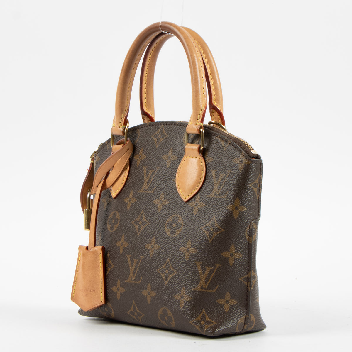 Shop this authentic Louis Vuitton Monogram Lockit BB Bag pre-loved on Labellov.com