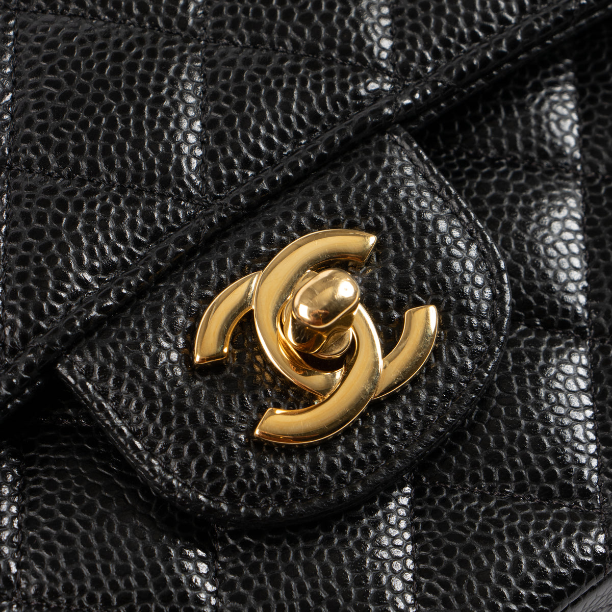 Shop this authentic luxury Chanel Black Caviar Medium Classic 11.12 Handbag Pre-Loved on Labellov.com