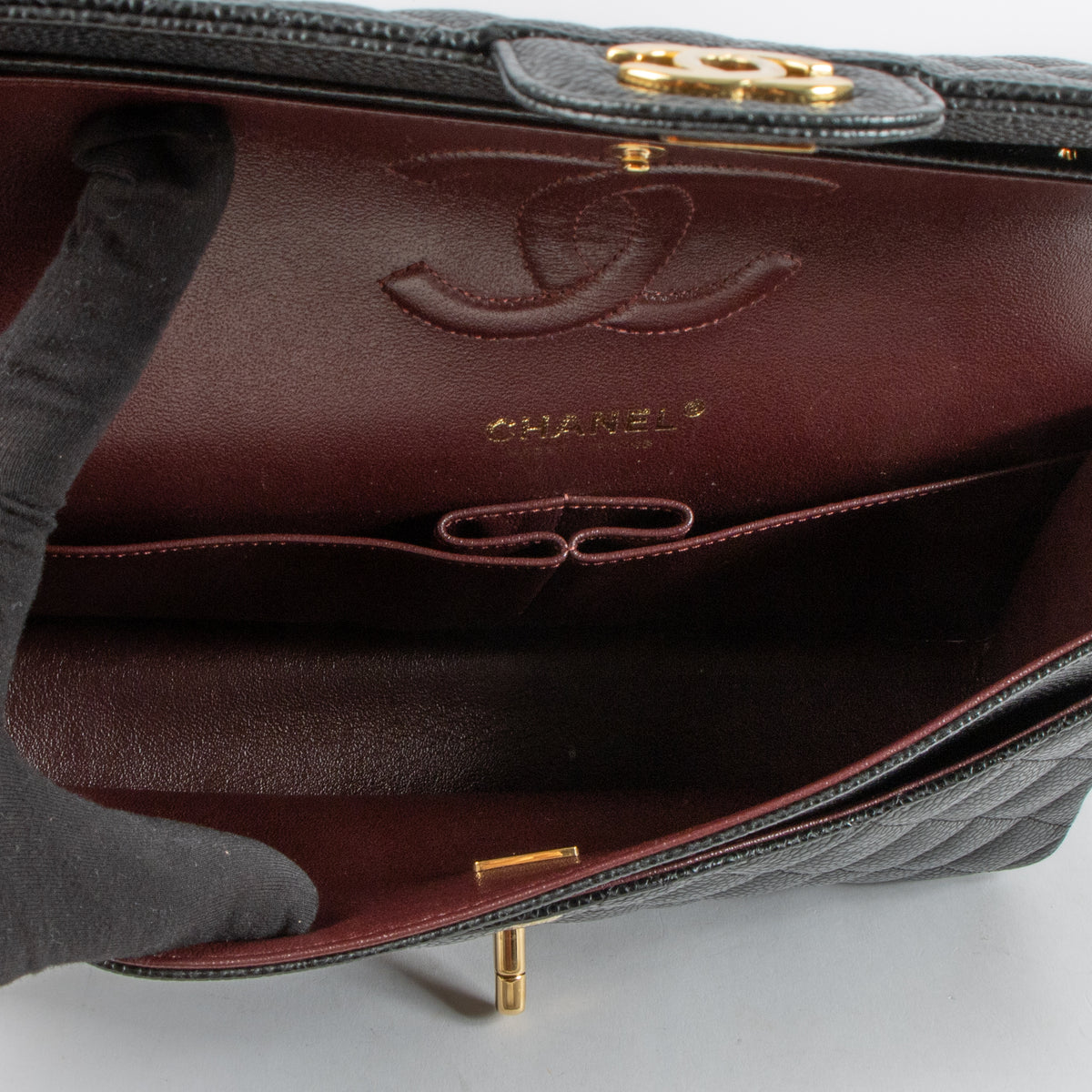Shop this authentic luxury Chanel Black Caviar Medium Classic 11.12 Handbag Pre-Loved on Labellov.com