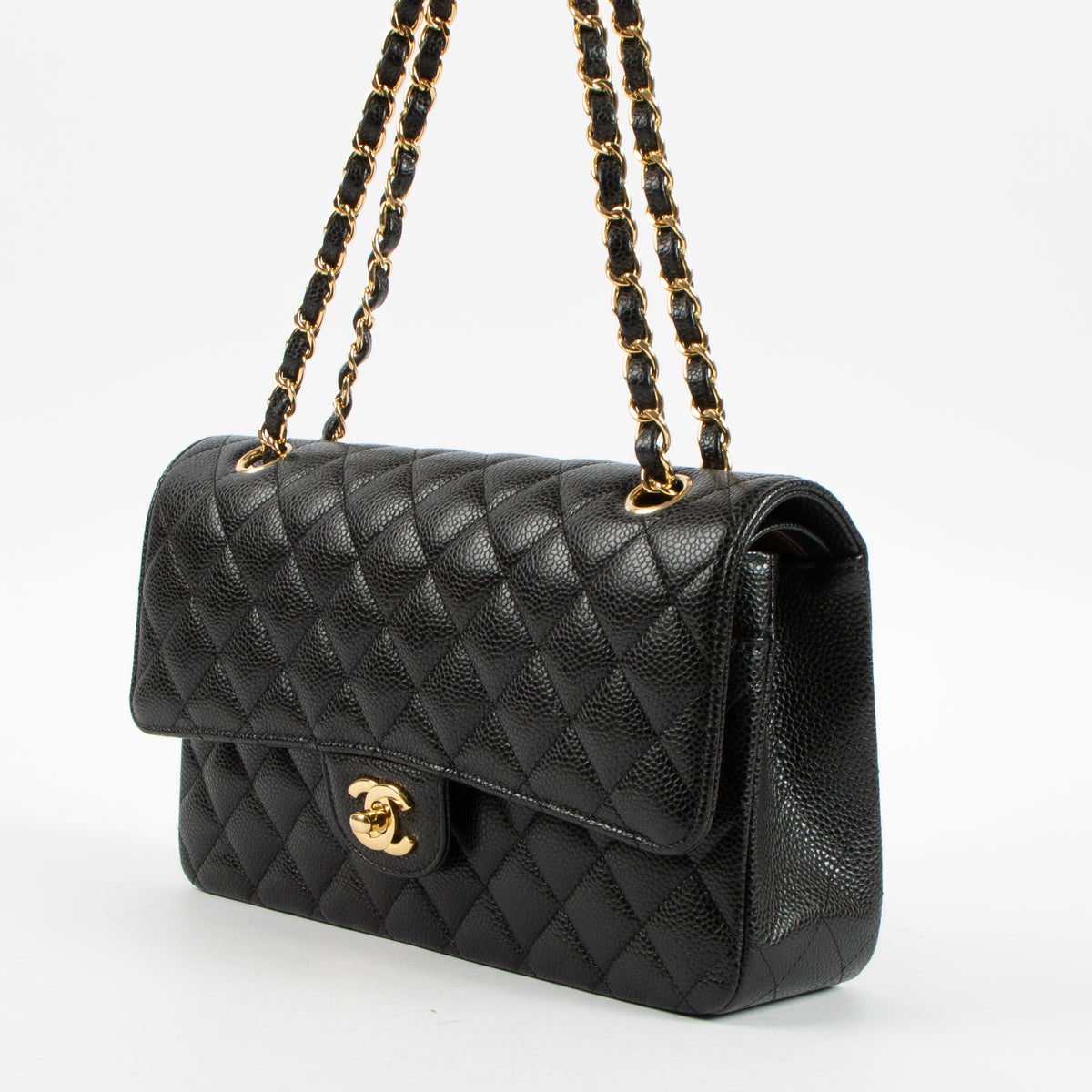 Shop this authentic luxury Chanel Black Caviar Medium Classic 11.12 Handbag Pre-Loved on Labellov.com