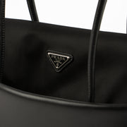 Shop this authentic luxury Prada Black Leather/Nylon Passage Medium Shoulder Bag Pre-Loved on Labellov.com