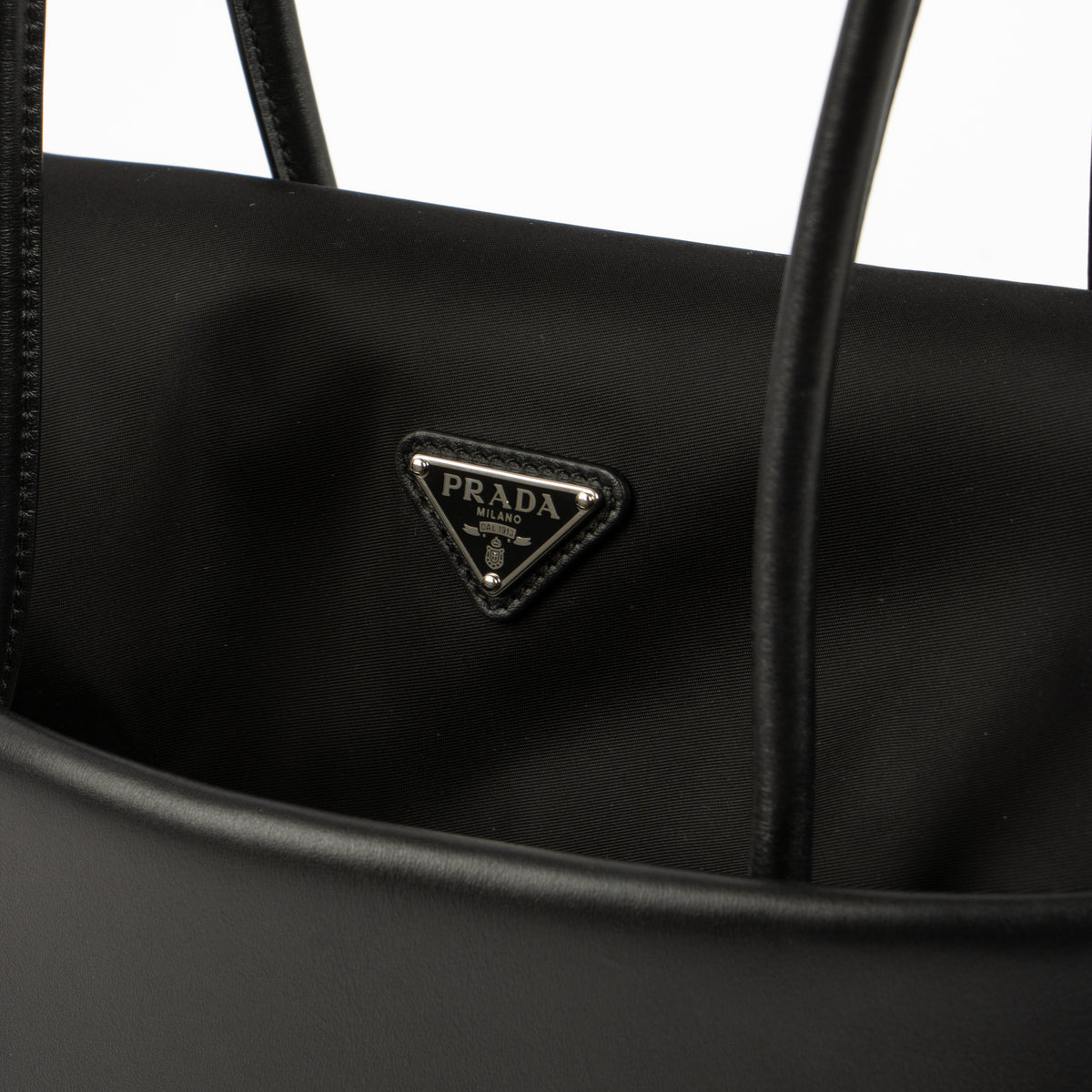 Shop this authentic luxury Prada Black Leather/Nylon Passage Medium Shoulder Bag Pre-Loved on Labellov.com