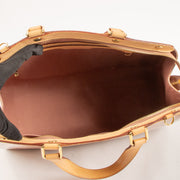 Shop this authentic Louis Vuitton Beige Poudre Monogram Vernis Brea GM Bag Pre-Loved on Labellov.com