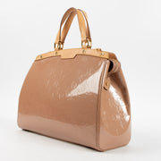 Shop this authentic Louis Vuitton Beige Poudre Monogram Vernis Brea GM Bag Pre-Loved on Labellov.com