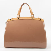 Shop this authentic Louis Vuitton Beige Poudre Monogram Vernis Brea GM Bag Pre-Loved on Labellov.com