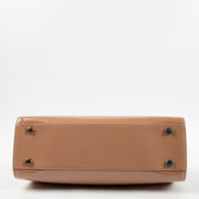 Shop this authentic Louis Vuitton Beige Poudre Monogram Vernis Brea GM Bag Pre-Loved on Labellov.com