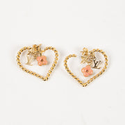 Shop this authentic Louis Vuitton Gold Tone Sweet Monogram Hoop Earrings Pre-Loved on Labellov.com