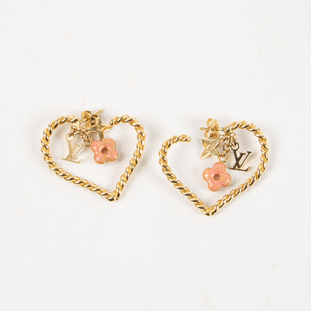 Shop this authentic Louis Vuitton Gold Tone Sweet Monogram Hoop Earrings Pre-Loved on Labellov.com