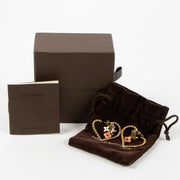 Shop this authentic Louis Vuitton Gold Tone Sweet Monogram Hoop Earrings Pre-Loved on Labellov.com