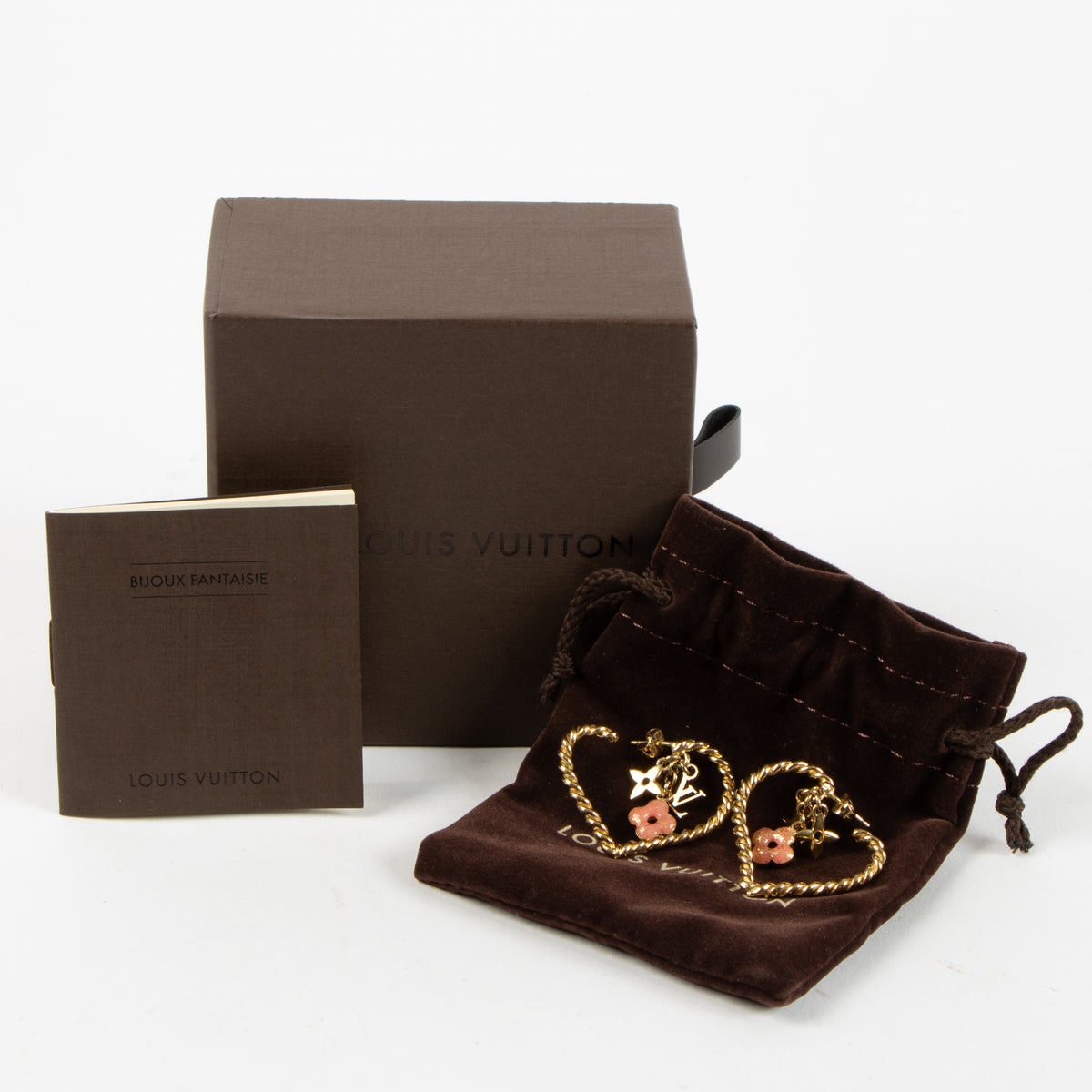 Shop this authentic Louis Vuitton Gold Tone Sweet Monogram Hoop Earrings Pre-Loved on Labellov.com