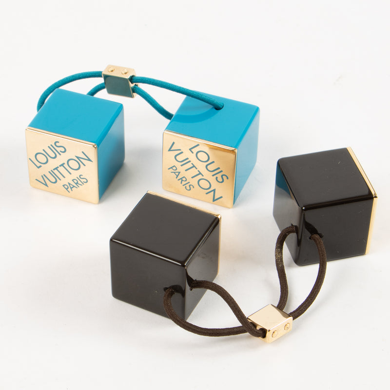 Shop this authentic Louis Vuitton Set of 2 Hair Cubes Pre-Loved on Labellov.com