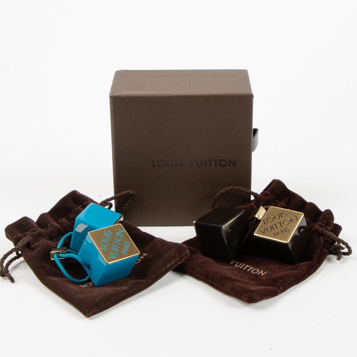 Shop this authentic Louis Vuitton Set of 2 Hair Cubes Pre-Loved on Labellov.com