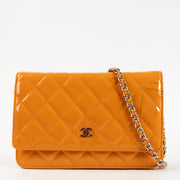 Shop this authentic Chanel Orange Patent Leather Classic Wallet On Chain Pre-Loved on Labellov.com