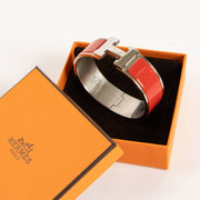 Shop this authentic Hermes Red Clic Clac H Bracelet Pre-Loved on Labellov.com