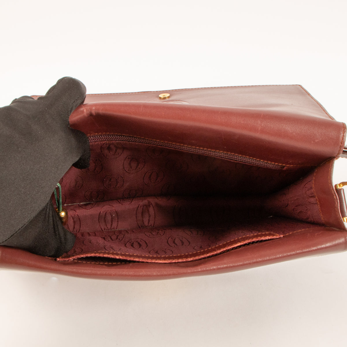 Shop this authentic Cartier Bordeaux C de Cartier Flap Bag Pre-Loved on Labellov.com