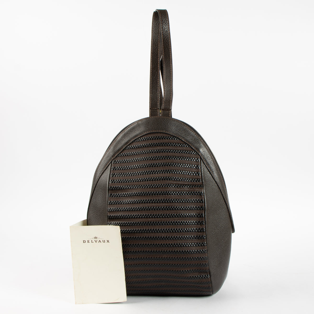 Shop this authentic Delvaux Brown Tissage Côtelé Azov Backpack Pre-Loved on Labellov.com