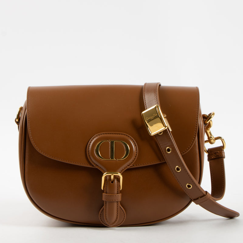 Shop this authentic Christian Dior Camel Calskin Medium Bobby Bag pre-loved on Labellov.com