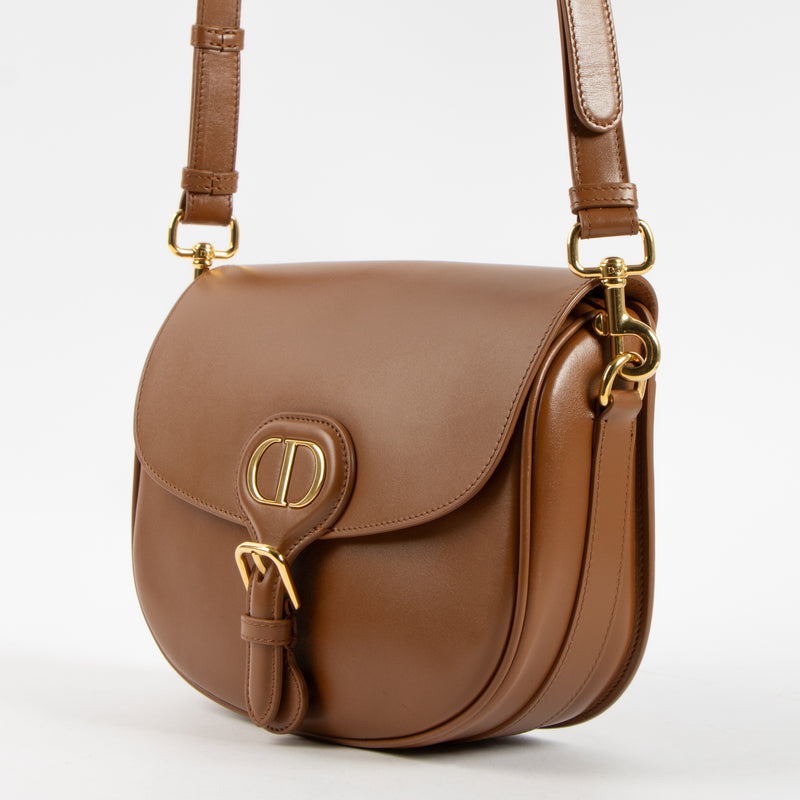 Shop this authentic Christian Dior Camel Calskin Medium Bobby Bag pre-loved on Labellov.com