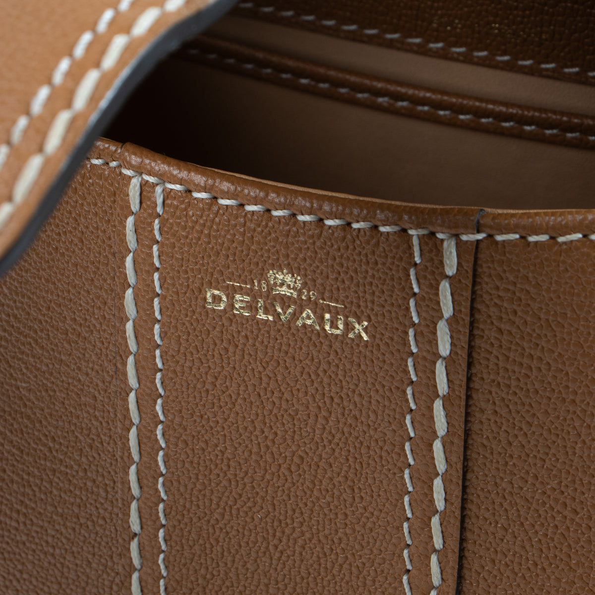 Shop this authentic luxury Delvaux Vegetal Rodeo Calf Brillant Mini Surpiqué Bag Pre-Loved on Labellov.com