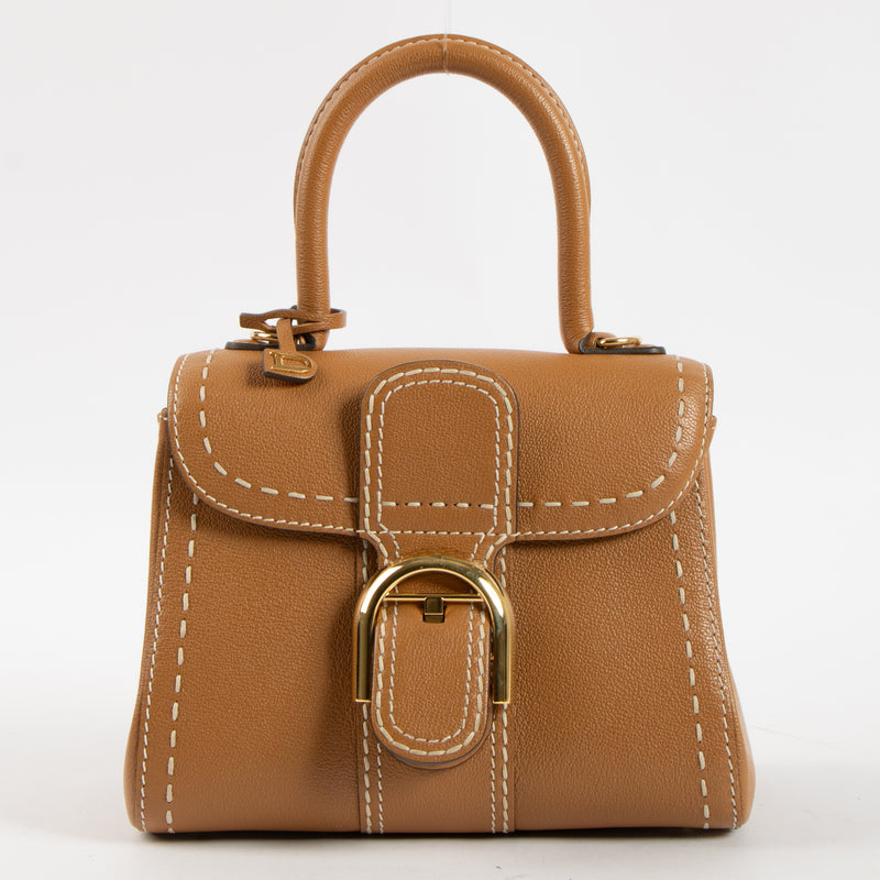 Shop this authentic luxury Delvaux Vegetal Rodeo Calf Brillant Mini Surpiqué Bag Pre-Loved on Labellov.com