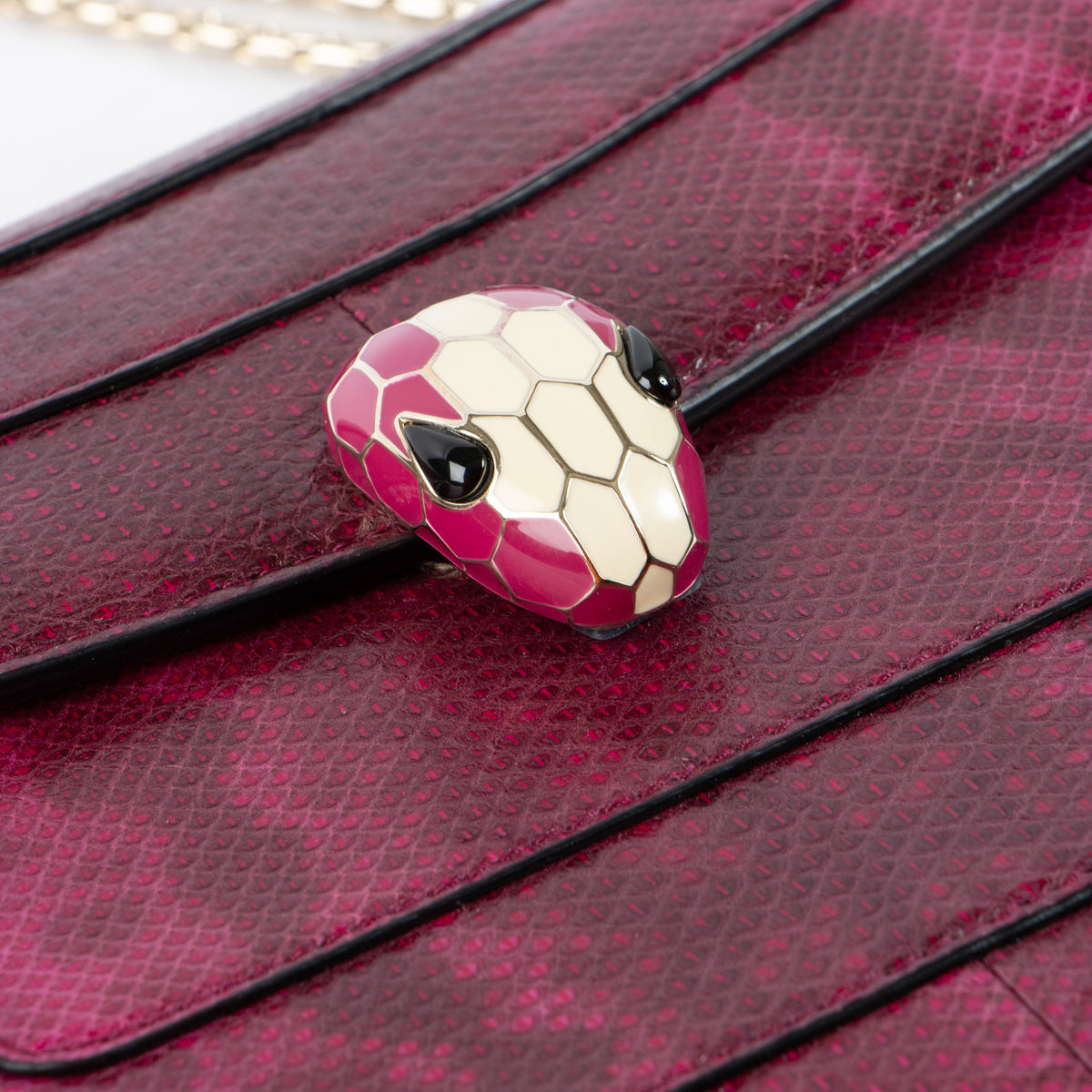 Shop this authentic Bulgari Fuchsia Karung Snakeskin Medium Serpenti Forever Bag pre-loved on Labellov.com