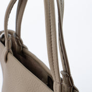 Shop this authentic The Row Taupe Calfskin Parker Small Tote Bag pre-loved on Labellov.com
