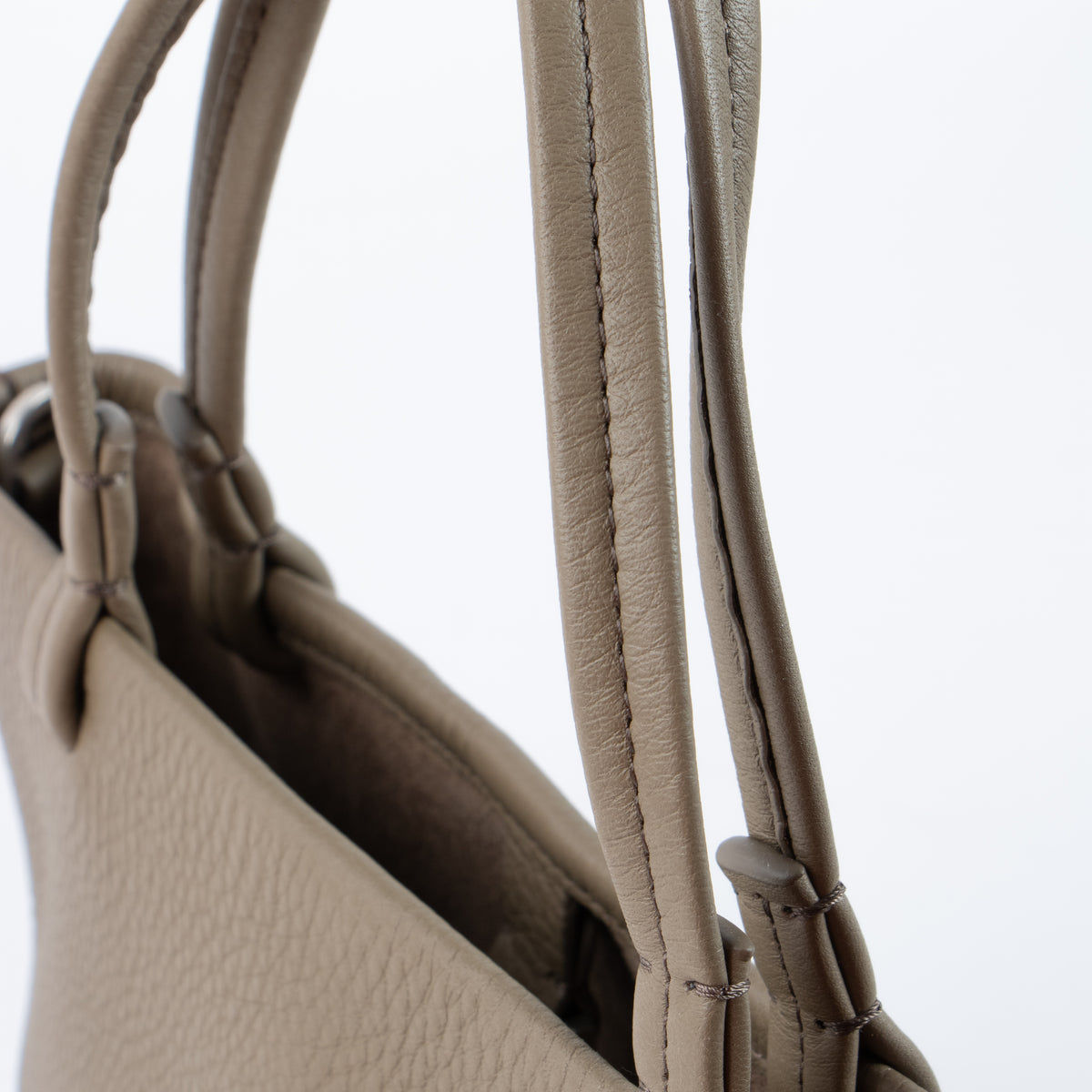 Shop this authentic The Row Taupe Calfskin Parker Small Tote Bag pre-loved on Labellov.com