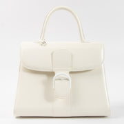 Shop this authentic Delvaux Ivory Box Calf Brillant GM Bag pre-loved on Labellov.com