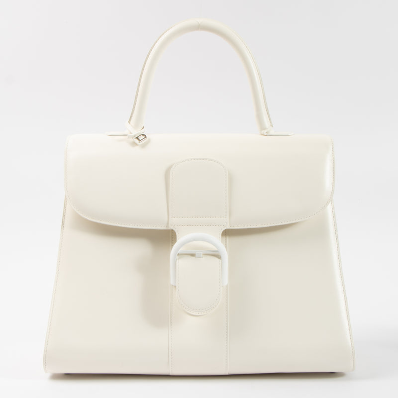 Shop this authentic Delvaux Ivory Box Calf Brillant GM Bag pre-loved on Labellov.com