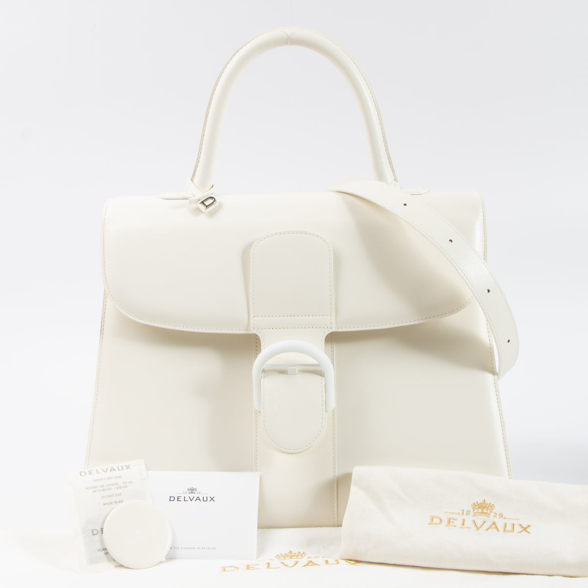 Shop this authentic Delvaux Ivory Box Calf Brillant GM Bag pre-loved on Labellov.com