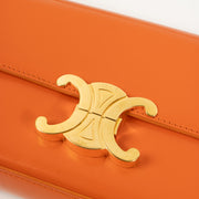 Shop this authentic Celine Orange Shiny Calfskin Claude Shoulder Bag pre-loved on Labellov.com