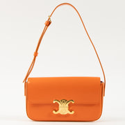 Shop this authentic Celine Orange Shiny Calfskin Claude Shoulder Bag pre-loved on Labellov.com