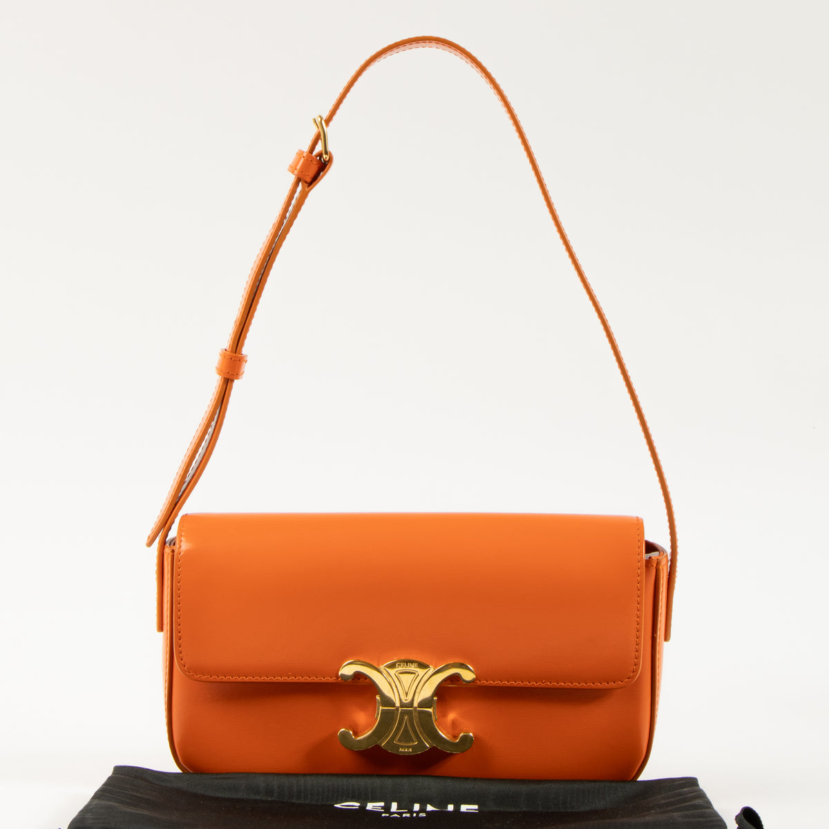 Shop this authentic Celine Orange Shiny Calfskin Claude Shoulder Bag pre-loved on Labellov.com